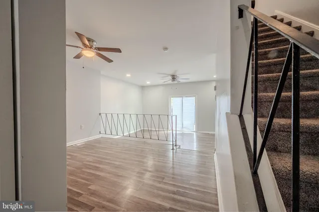 a view of entryway with wooden floor