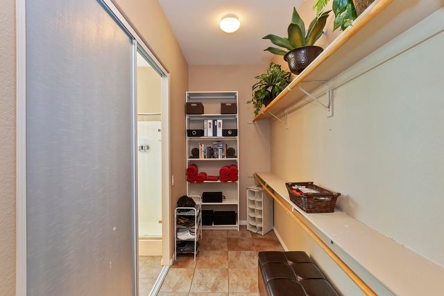 a room with furniture and white walls