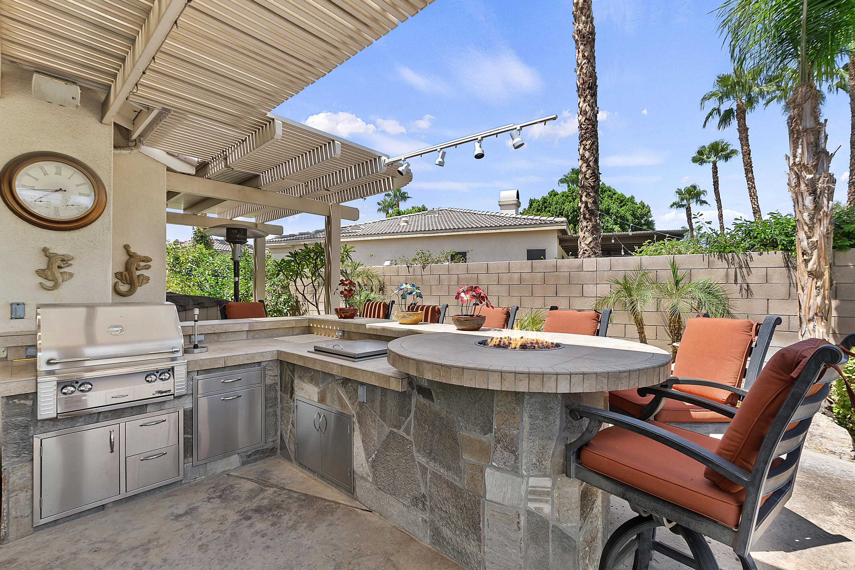 43328 Bordeaux Drive La Quinta, CA 92253 - Photo 32 of 38 a view of a patio with table and chairs