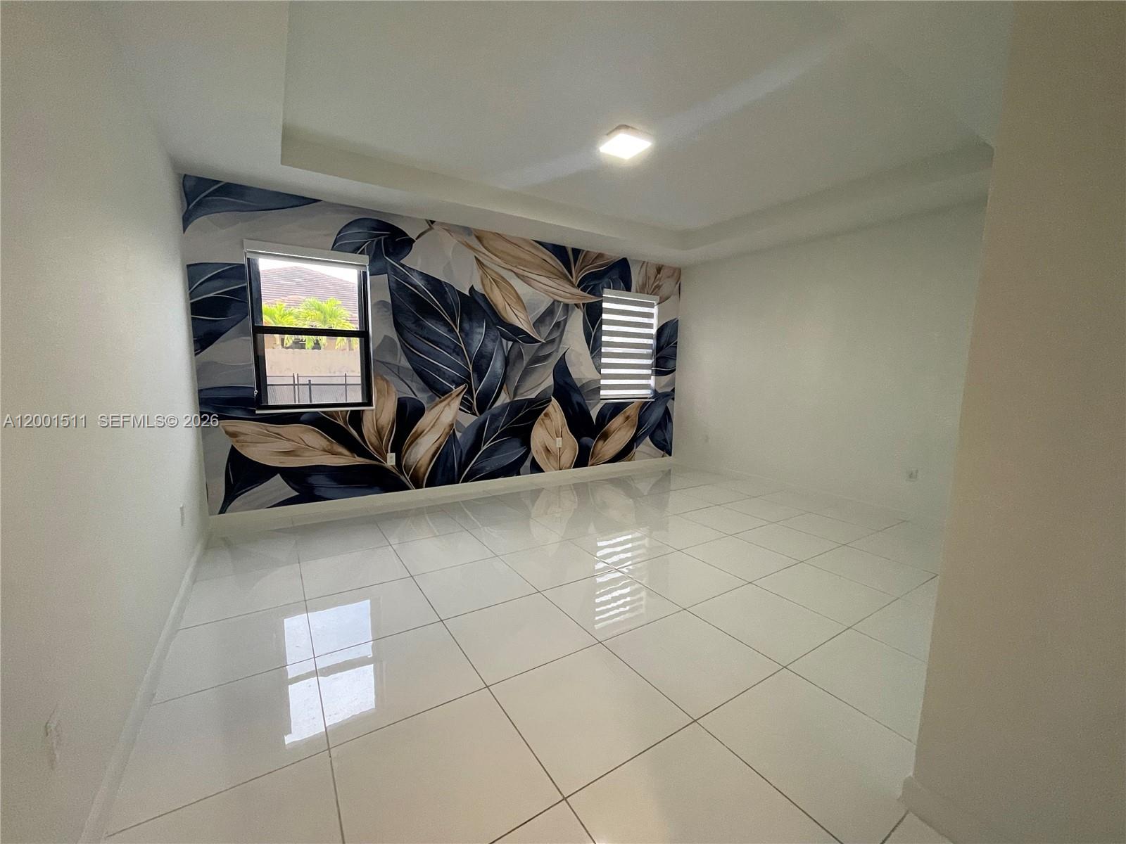 4451 Southwest 159th Path Miami, FL 33185 - Photo 23 of 24 a view of room with gym equipment