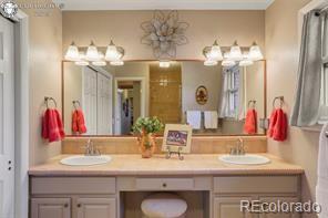 6100 Waterbarrel Road Beulah, CO 81023 - Photo 19 of 50 a bathroom with a sink and a mirror