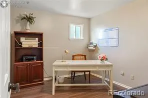 a workspace with furniture and window