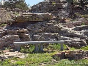 a view of a big yard with a house
