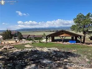 a view of a swimming pool with an ocean view