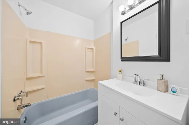 a bathroom with a sink and a bathtub