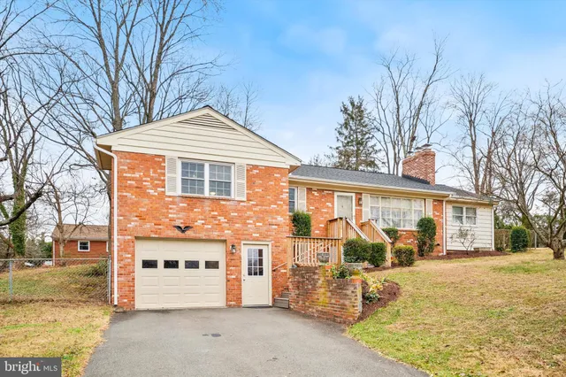 a front view of a house with a outdoor space