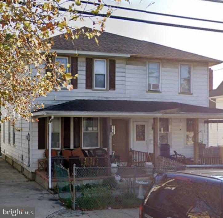 54 Webster Street Riverside, NJ 08075 - Photo 1 of 1 a front view of house with yard and seating area