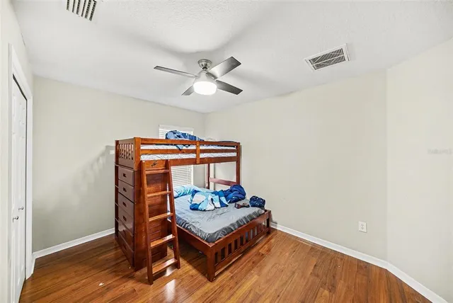 a bathroom with a sink a mirror and a shower