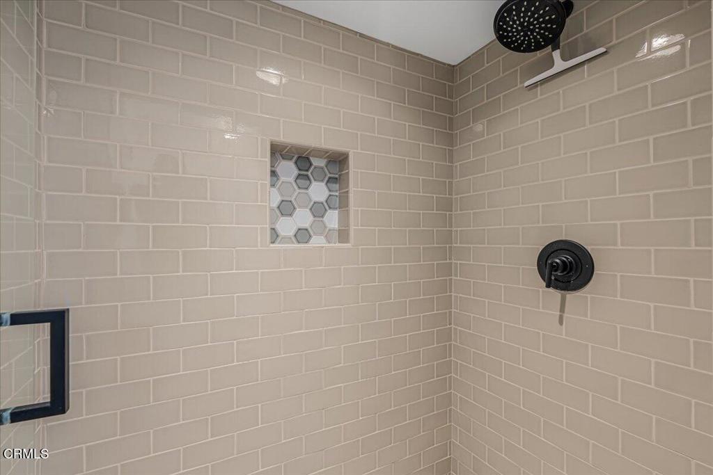 13902 Calvert Street Van Nuys, CA 91401 - Photo 6 of 33 a bathroom with a shower