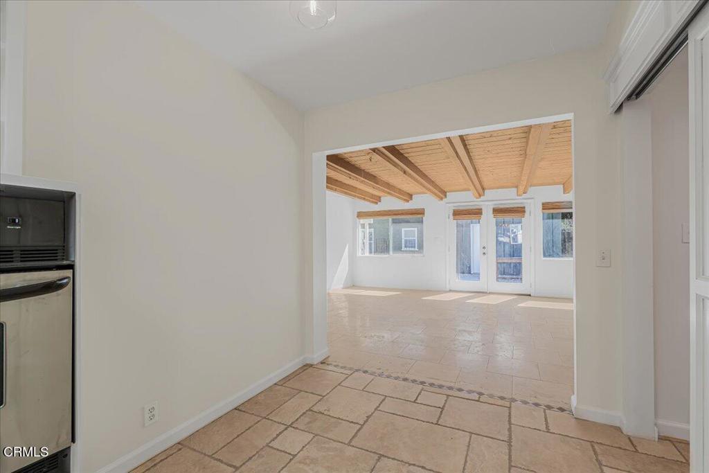 13902 Calvert Street Van Nuys, CA 91401 - Photo 10 of 33 a view of an empty room with windows