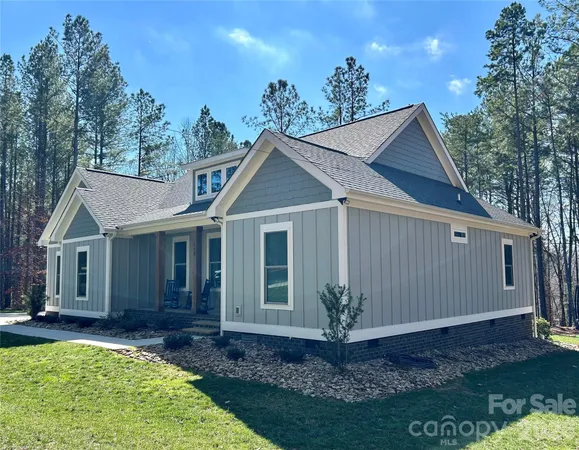 a view of a house with garden