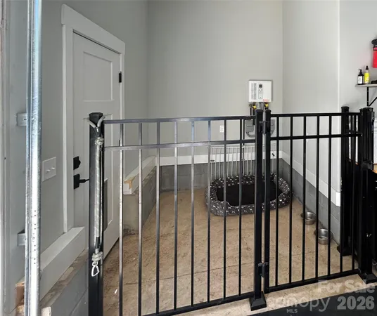 a backyard of apartments with large trees