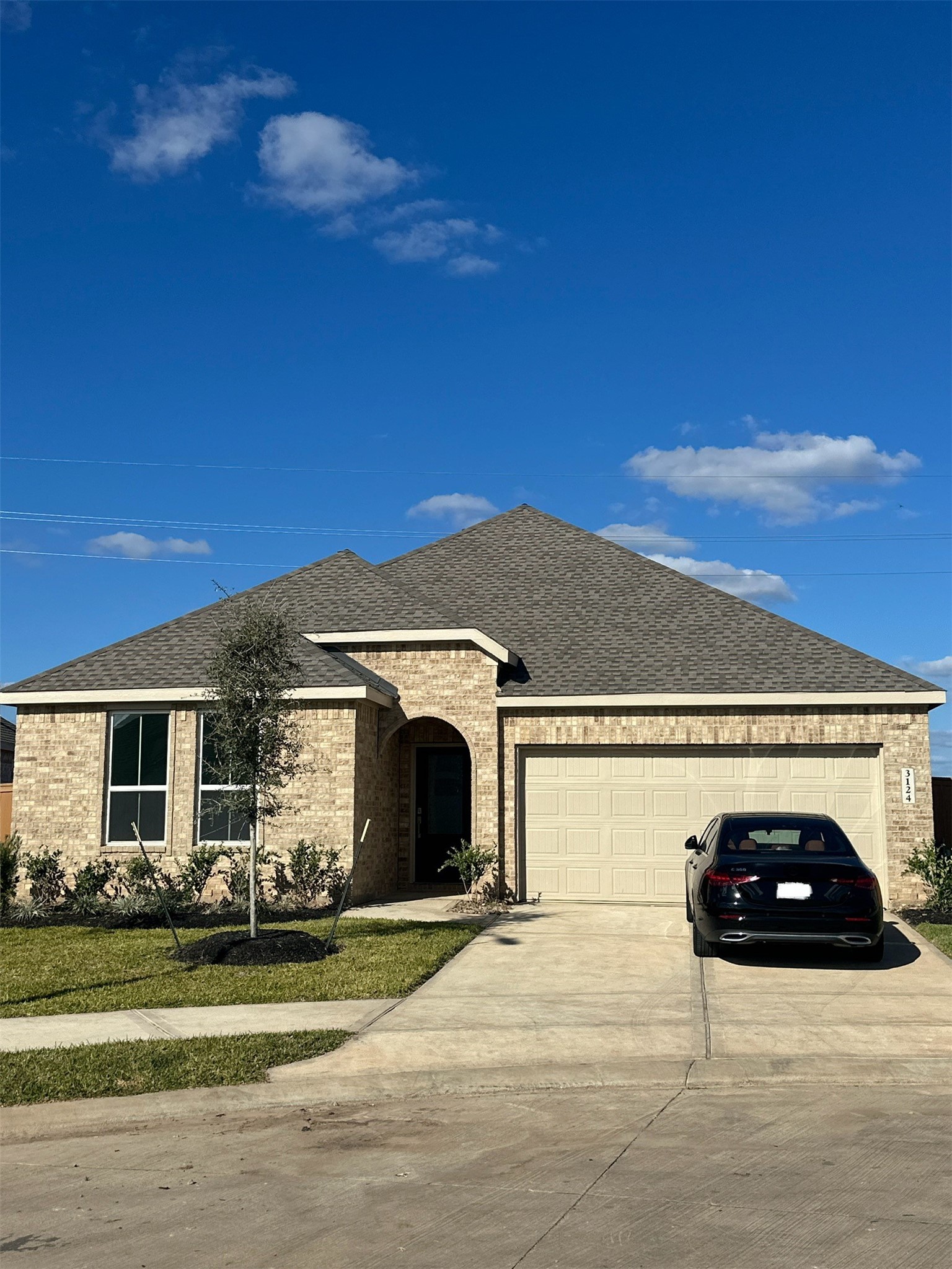 3124 Ruby Ridge Drive Katy, TX 77493 - Photo 1 of 12 a view of a white house with a yard and garage