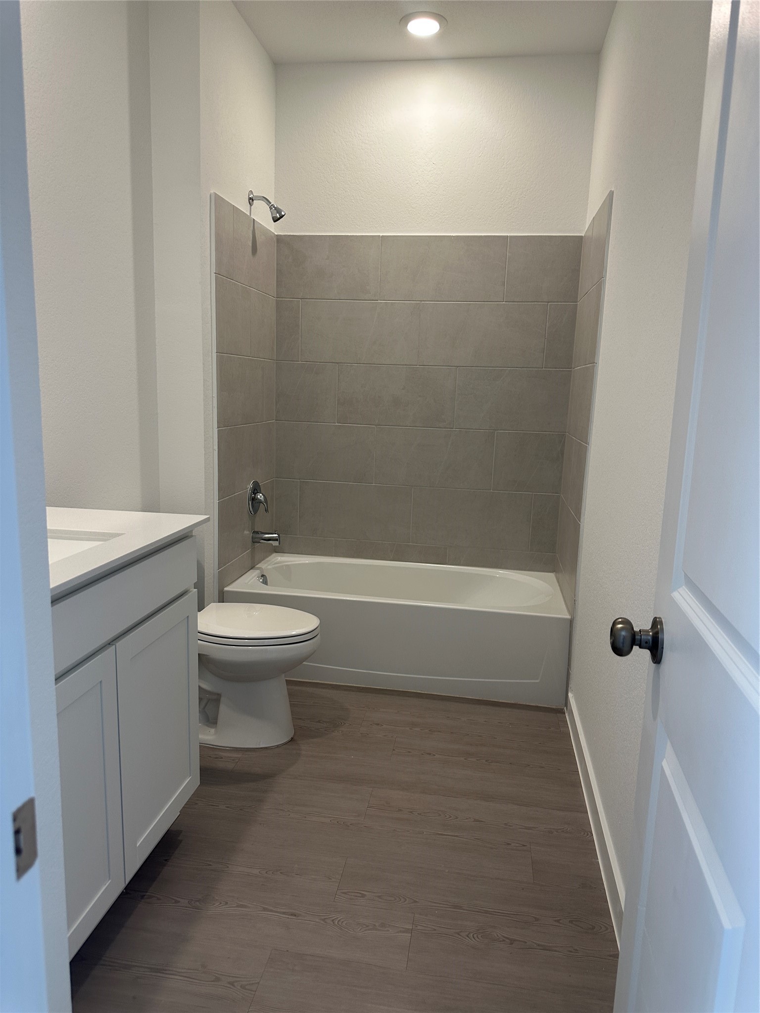 3124 Ruby Ridge Drive Katy, TX 77493 - Photo 8 of 12 a bathroom with a toilet a sink and bathtub