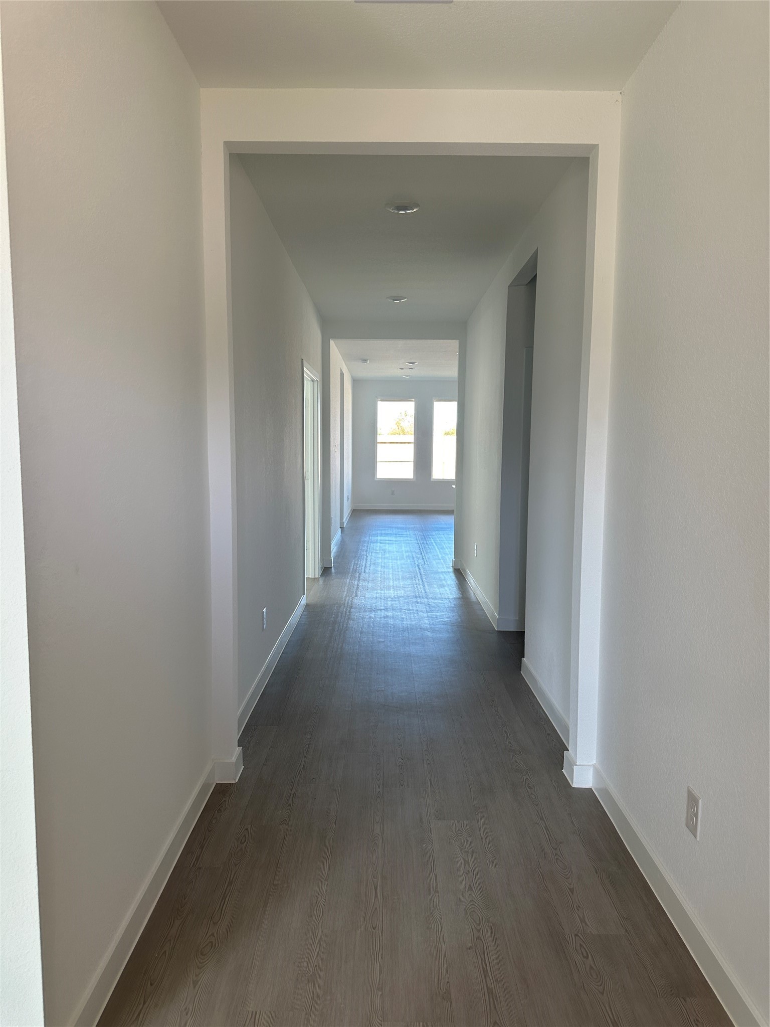 3124 Ruby Ridge Drive Katy, TX 77493 - Photo 9 of 12 a view of a hallway with wooden floor