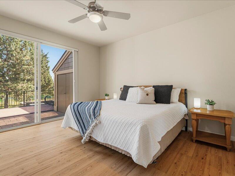 1378 Highland View Loop Redmond, OR 97756 - Photo 28 of 98 a bedroom with a bed and wooden floor