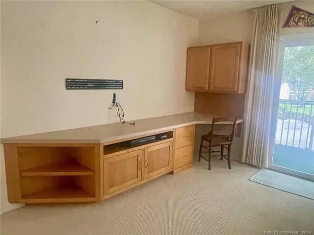 a kitchen with stainless steel appliances a stove and a refrigerator