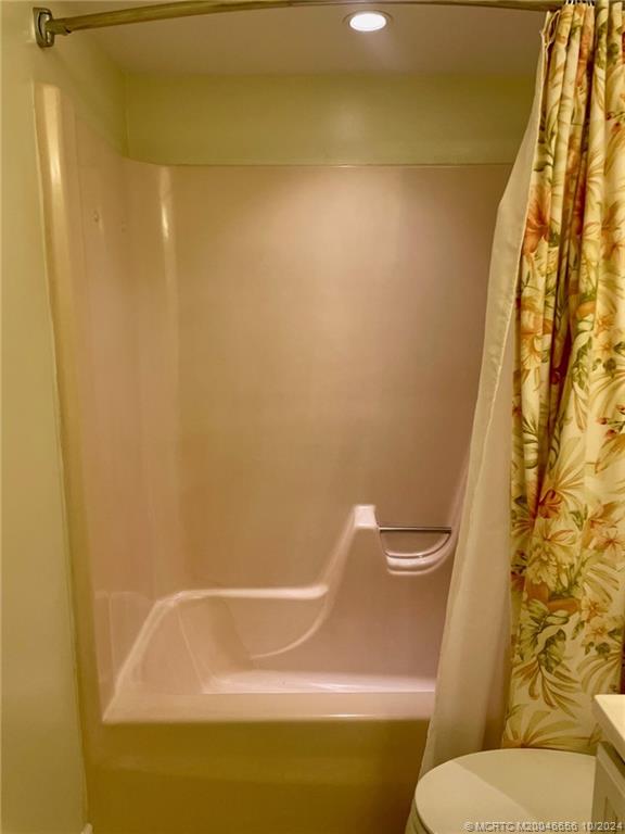 1225 Northwest 21st Street, Unit 3014 Stuart, FL 34994 - Photo 17 of 37 a bathroom with a sink and a toilet