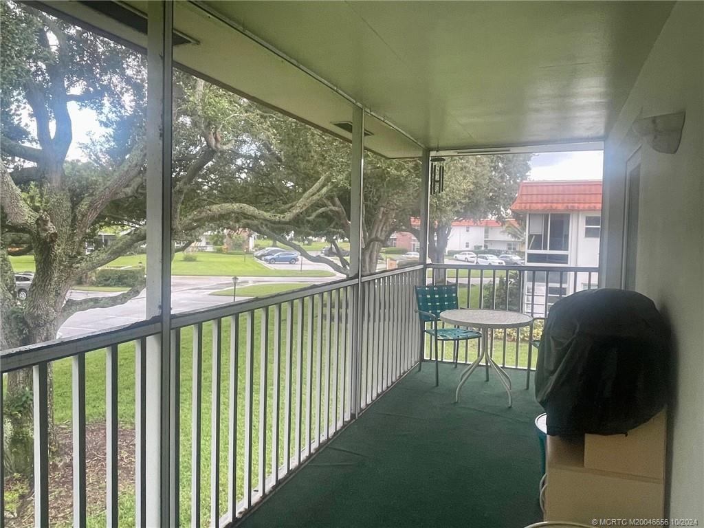 1225 Northwest 21st Street, Unit 3014 Stuart, FL 34994 - Photo 25 of 37 a view of a porch