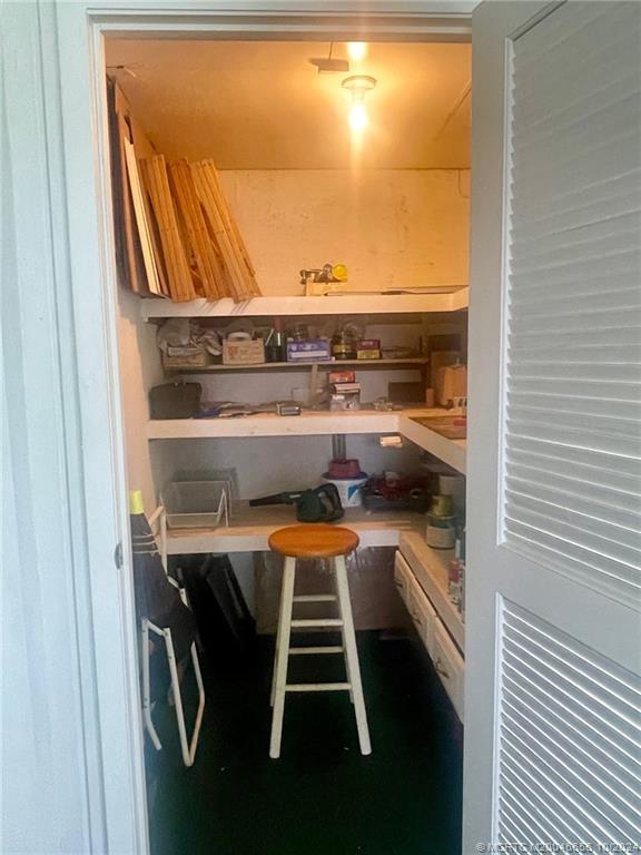 1225 Northwest 21st Street, Unit 3014 Stuart, FL 34994 - Photo 27 of 37 a view of outdoor space with seating area