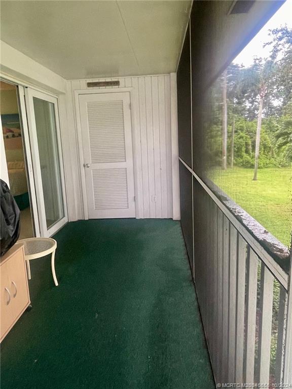 1225 Northwest 21st Street, Unit 3014 Stuart, FL 34994 - Photo 28 of 37 a view of outdoor space and deck