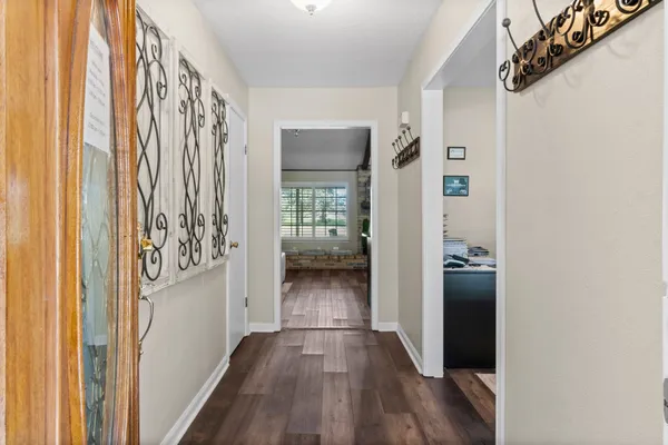a view of entryway with wooden floor
