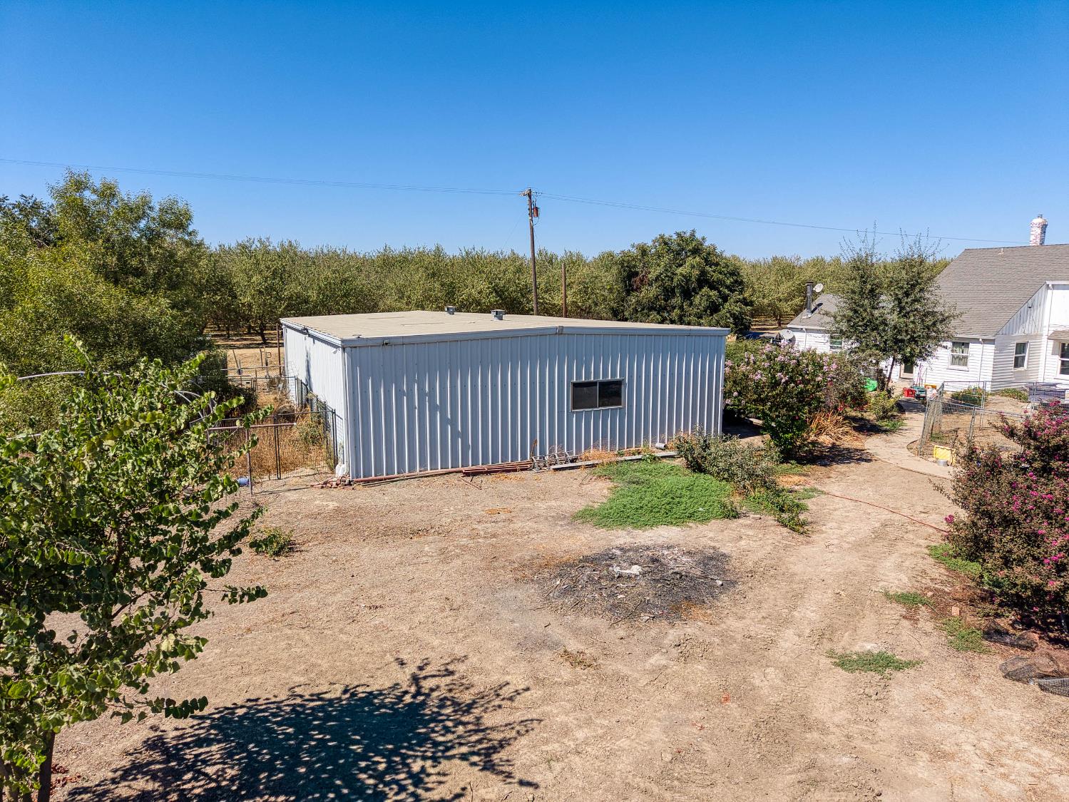 743 College City Road Arbuckle, CA 95912 - Photo 36 of 61 a view of a house with a yard and garage
