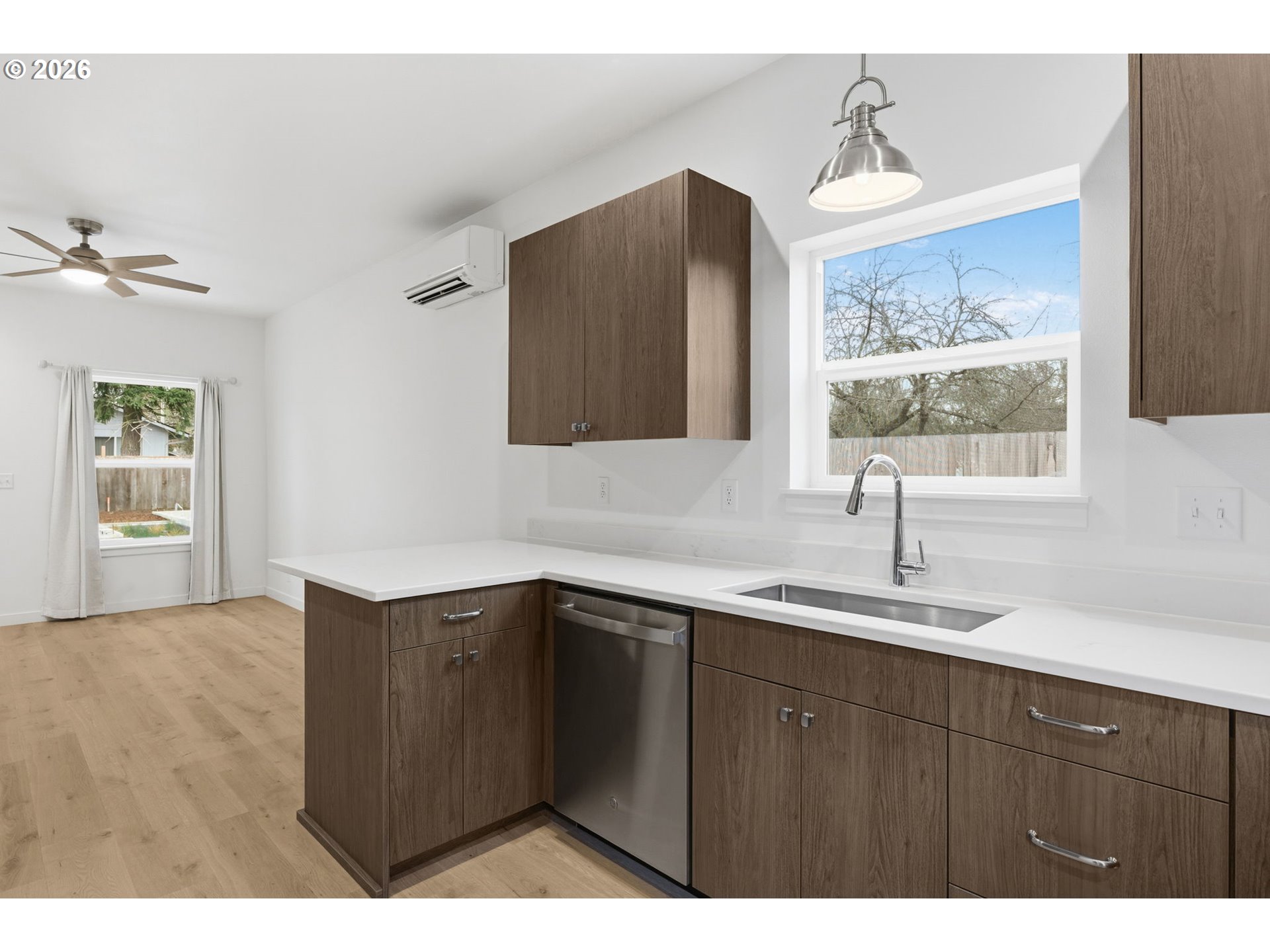 5592 Burnett Avenue, Unit B Eugene, OR 97402 - Photo 11 of 36 a kitchen with a sink cabinets and a window
