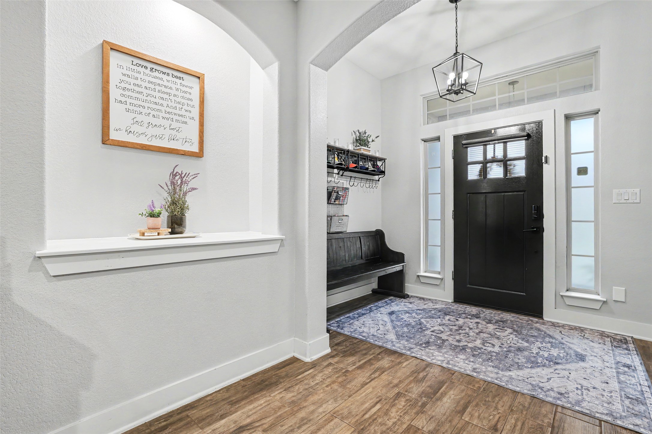 117 Rock Dock Road Georgetown, TX 78633 - Photo 4 of 38 a view of a hallway to a livingroom with furniture and windows
