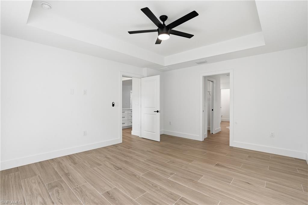 3903 15th Street Southwest Lehigh Acres, FL 33976 - Photo 18 of 44 a view of an empty room