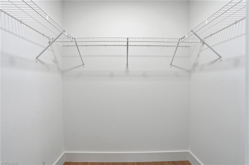 3903 15th Street Southwest Lehigh Acres, FL 33976 - Photo 22 of 44 a view of a room with racks on the wall