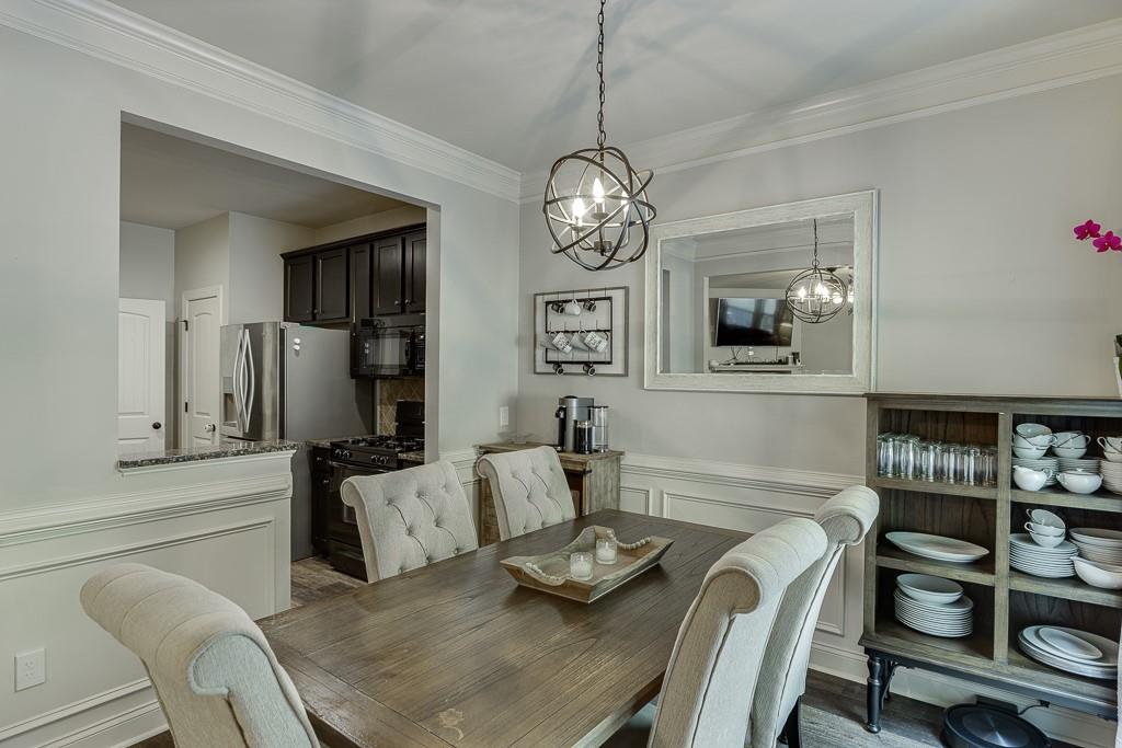 2140 Harvest Ridge Circle Northeast Buford, GA 30519 - Photo 14 of 38 a view of a dining room with furniture
