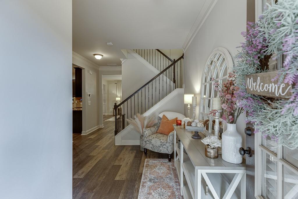 2140 Harvest Ridge Circle Northeast Buford, GA 30519 - Photo 4 of 38 a view of entryway and hall with wooden floor