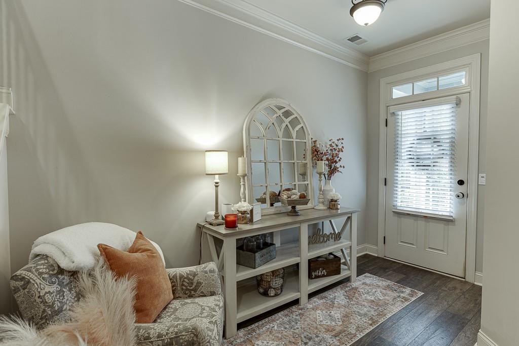 2140 Harvest Ridge Circle Northeast Buford, GA 30519 - Photo 5 of 38 a bedroom with furniture and a window
