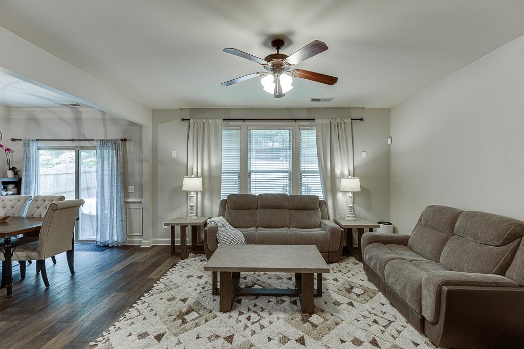 2140 Harvest Ridge Circle Northeast Buford, GA 30519 - Photo 10 of 38 a living room with furniture and wooden floor