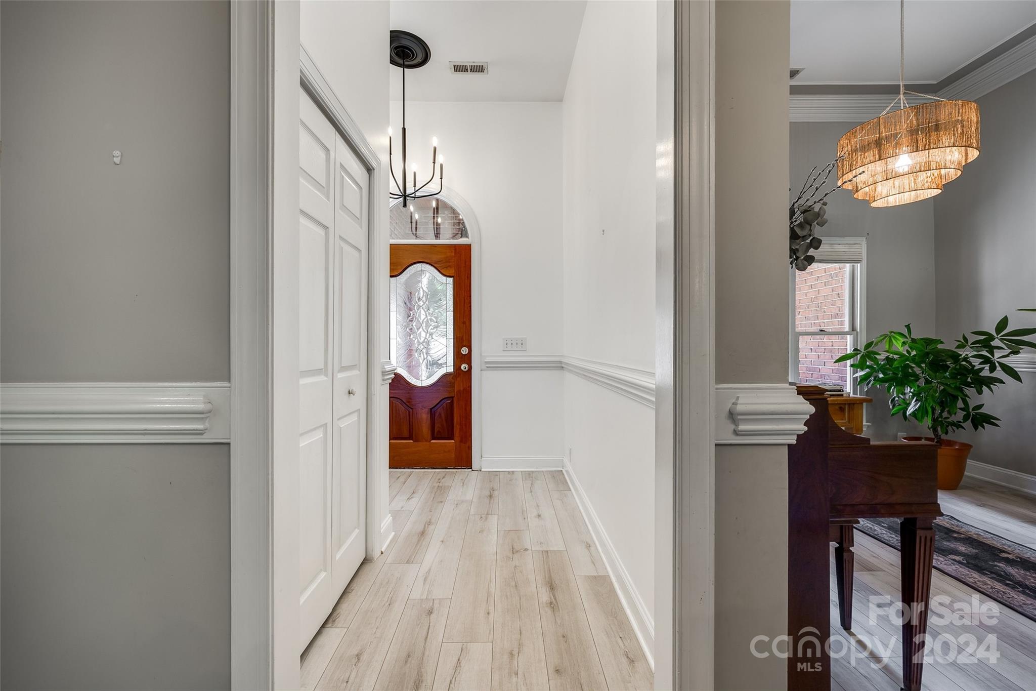 106 Finch Loop Road Fort Mill, SC 29715 - Photo 3 of 43 a view of entryway with wooden floor