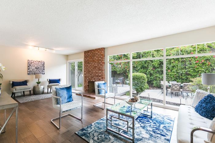 1324 Flicker Way Sunnyvale, CA 94087 - Photo 1 of 33 a living room with furniture and a large window