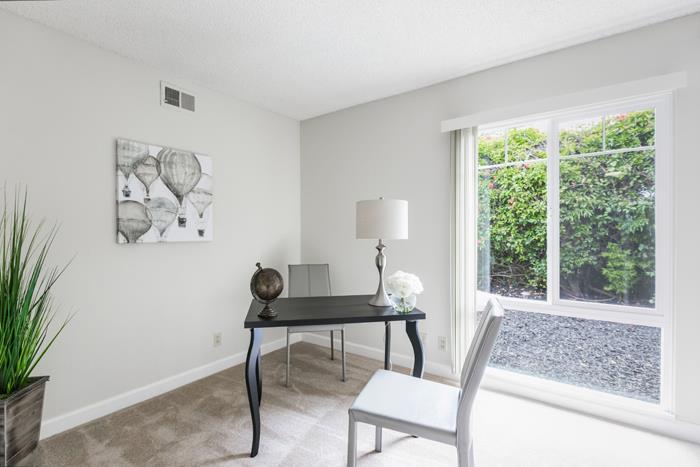 1324 Flicker Way Sunnyvale, CA 94087 - Photo 12 of 33 a view of a workspace room with wooden floor and a window