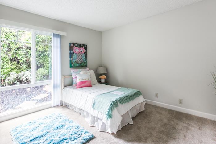 1324 Flicker Way Sunnyvale, CA 94087 - Photo 13 of 33 a bedroom with a bed and a large window