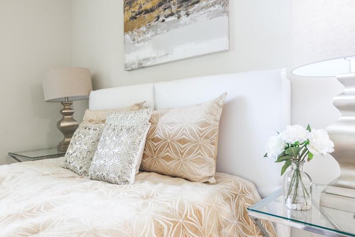 1324 Flicker Way Sunnyvale, CA 94087 - Photo 18 of 33 a bed sitting in a bedroom next to a white wall