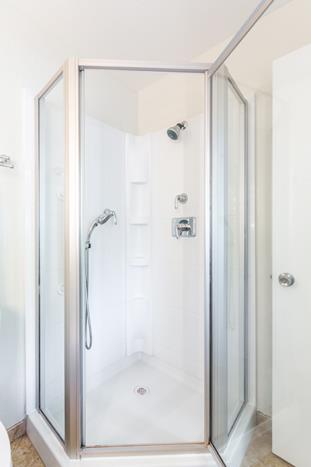 1324 Flicker Way Sunnyvale, CA 94087 - Photo 20 of 33 a bathroom with a glass shower door