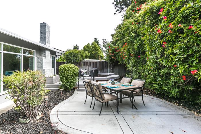 1324 Flicker Way Sunnyvale, CA 94087 - Photo 28 of 33 a view of a patio with table and chairs and potted plants