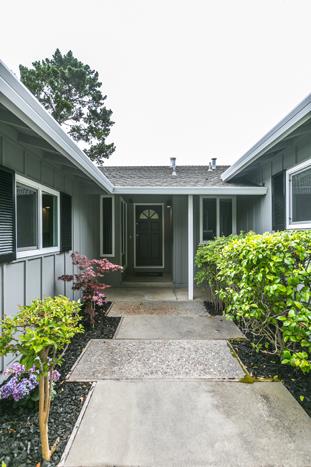 1324 Flicker Way Sunnyvale, CA 94087 - Photo 33 of 33 a front view of a house with a yard and potted plants