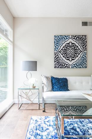 1324 Flicker Way Sunnyvale, CA 94087 - Photo 4 of 33 a living room with a couch and a rug