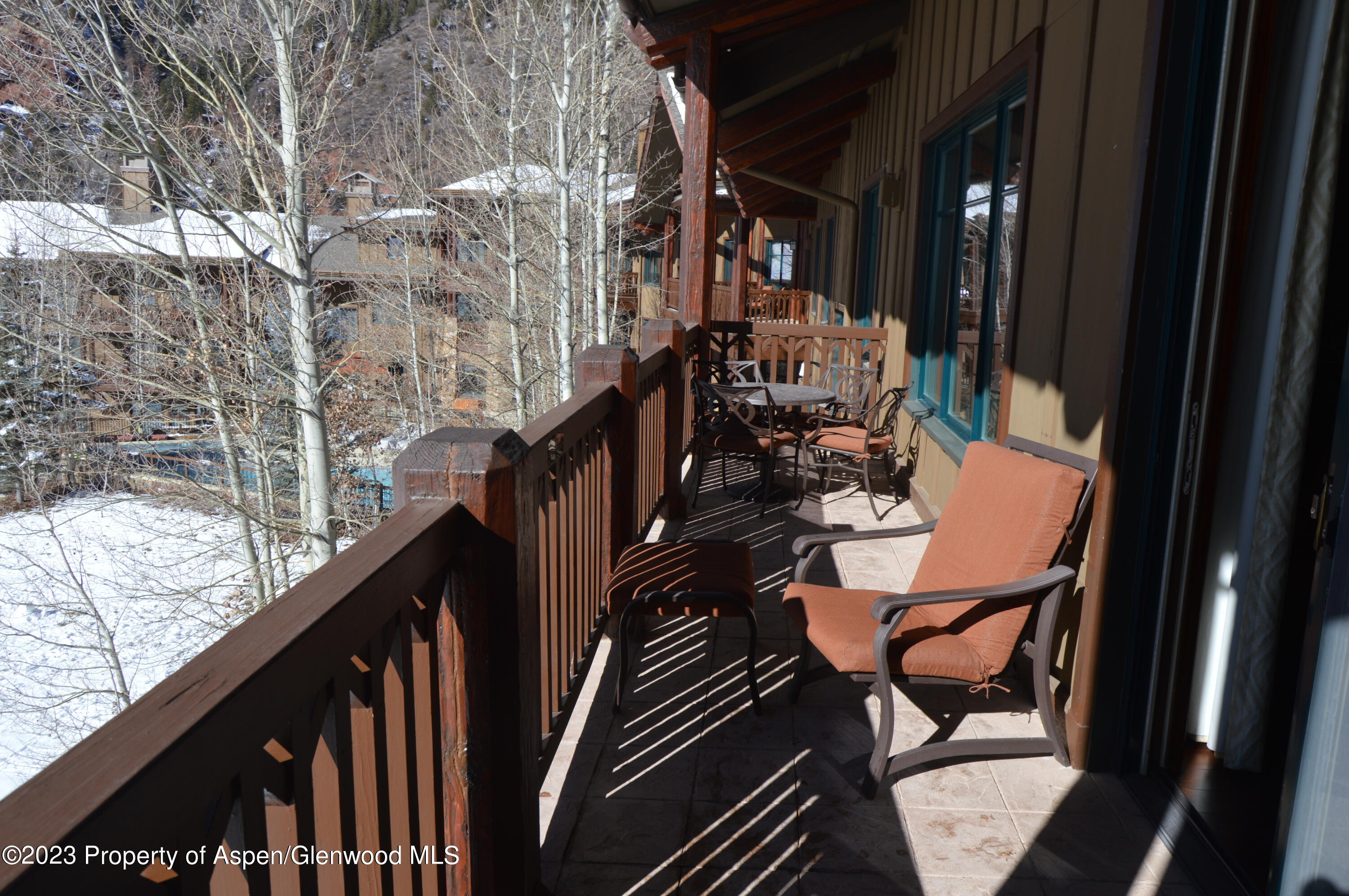 197 Prospector Road, Unit 2405 SUMMER INTEREST 12 Aspen, CO 81611 - Photo 4 of 24 a view of balcony and chairs