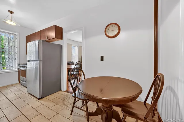 a kitchen with a sink cabinets and window