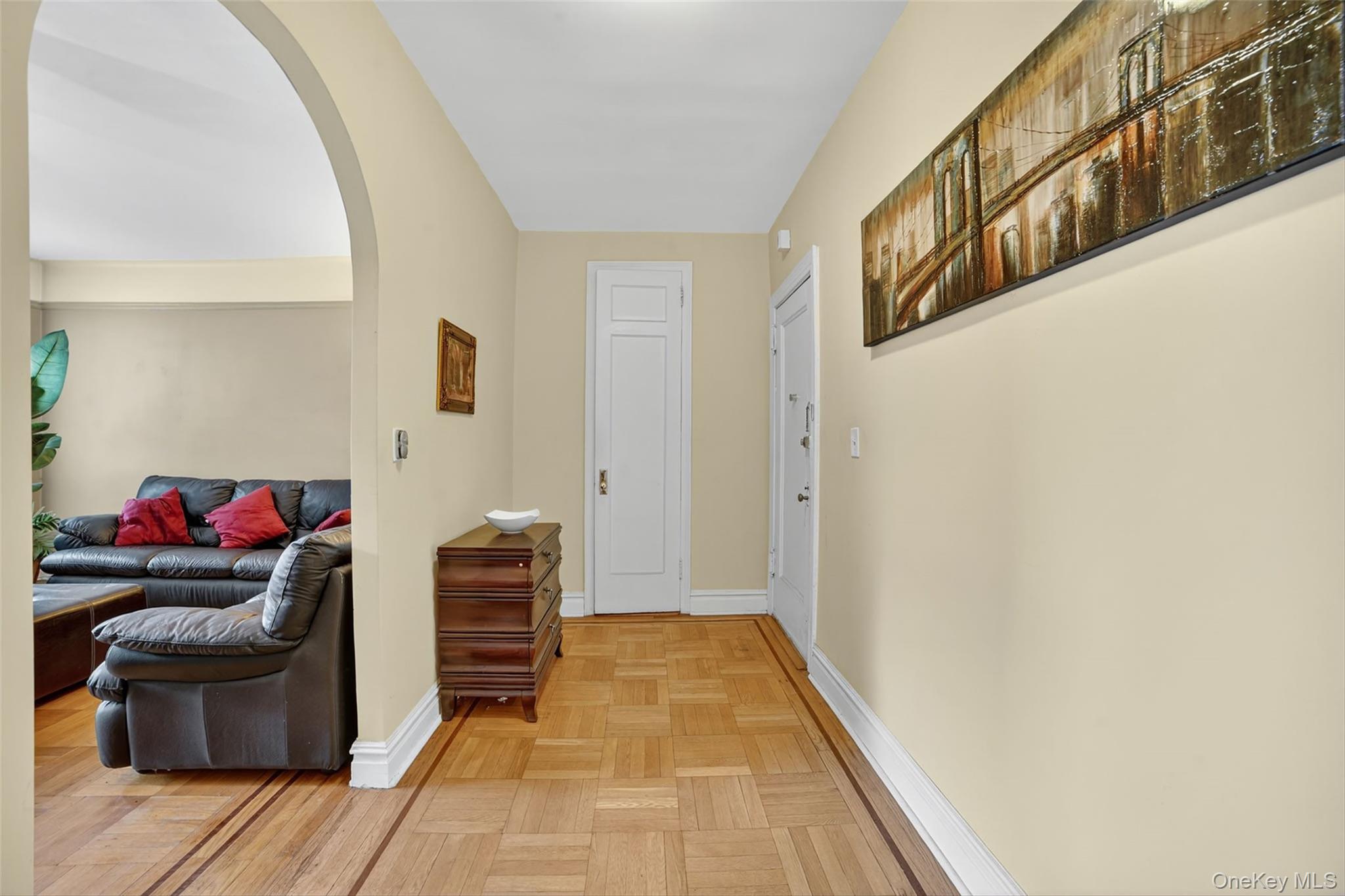 219 Bronx River Road, Unit 2L Yonkers, NY 10704 - Photo 25 of 29 a living room with furniture and a rug