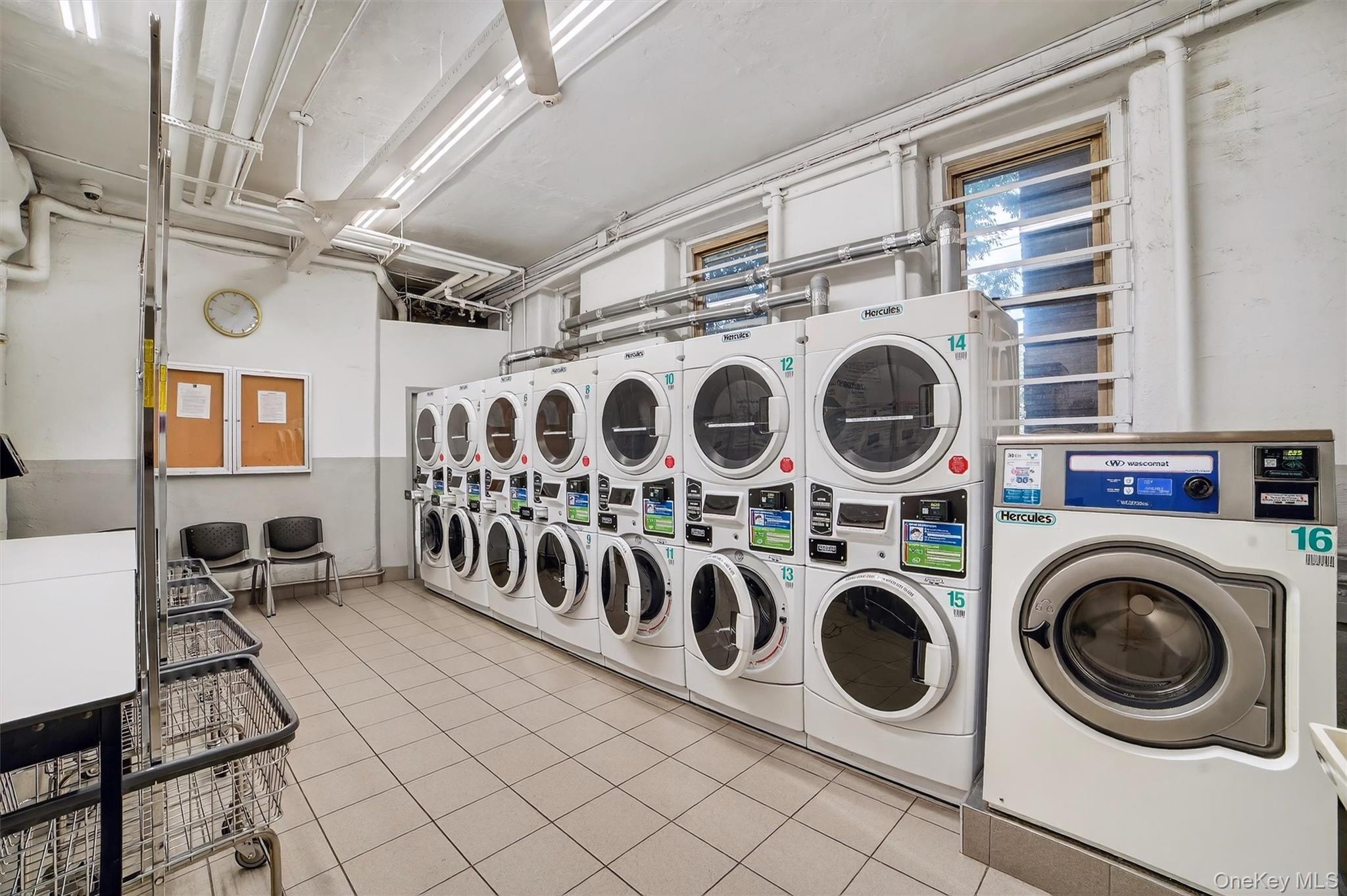 219 Bronx River Road, Unit 2L Yonkers, NY 10704 - Photo 26 of 29 a utility room with dryer and washer