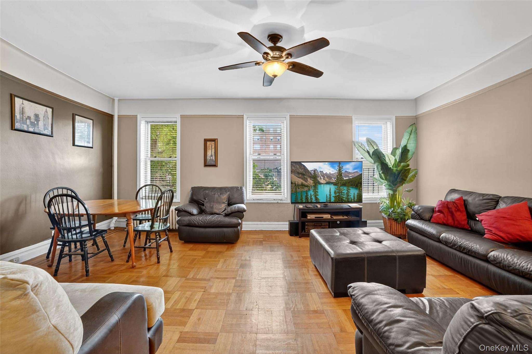 219 Bronx River Road, Unit 2L Yonkers, NY 10704 - Photo 5 of 29 a living room with furniture kitchen view and a window
