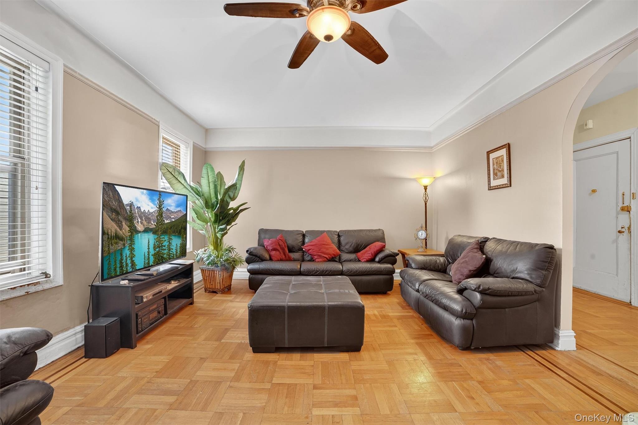 219 Bronx River Road, Unit 2L Yonkers, NY 10704 - Photo 6 of 29 a living room with furniture and a large window